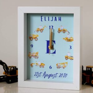 Personalised picture clock with diggers and construction vehicles sitting on table