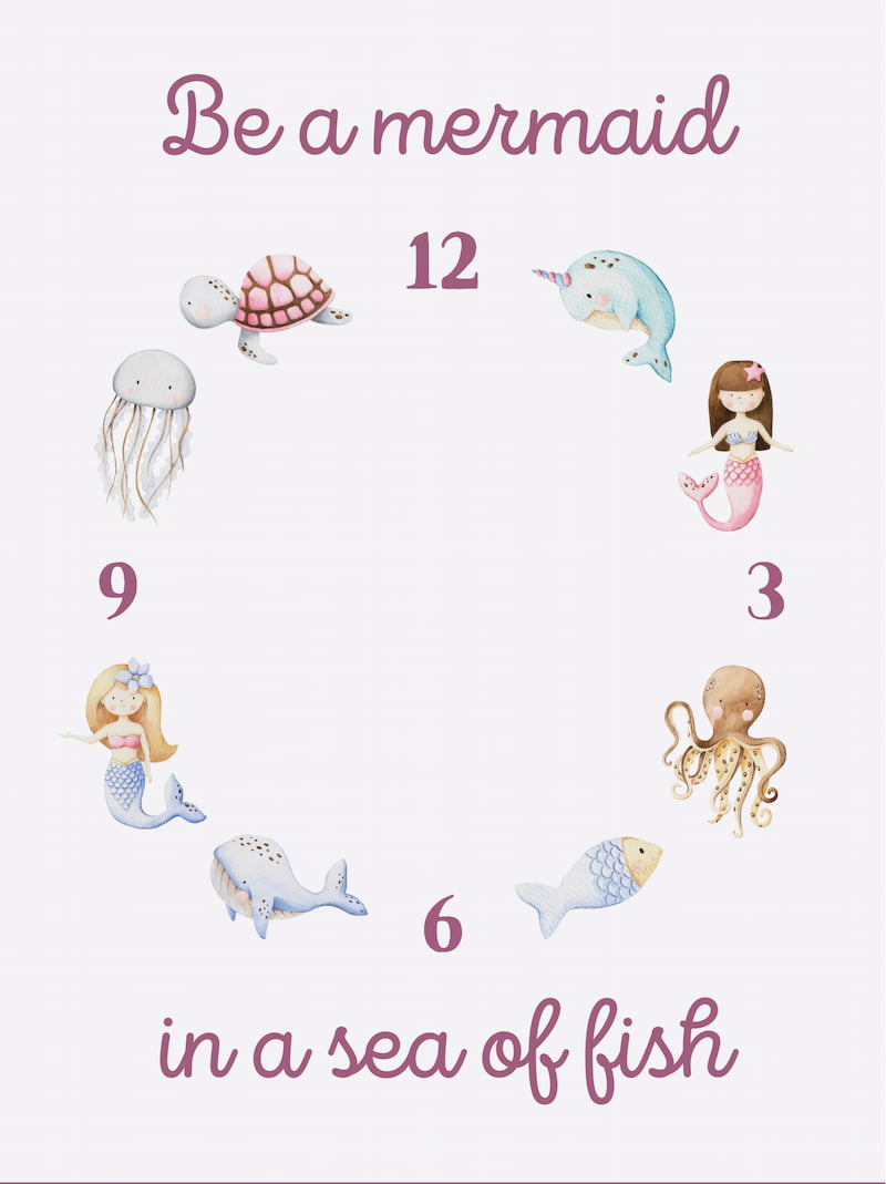Clock face with mermaids, fish and turtles on it